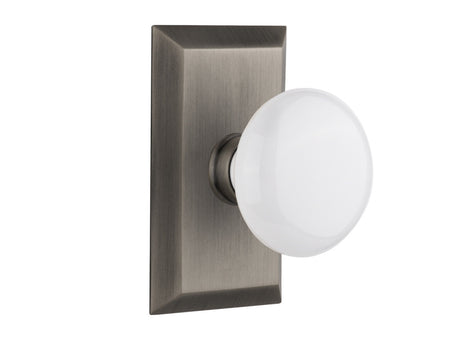 Nostalgic 713298: Studio Backplate w/White Porcelain Knob Passage Door Set - Antique Pewter