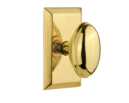 Nostalgic 713322: Studio Backplate w/Homestead Knob Privacy Door Set - Polished Brass
