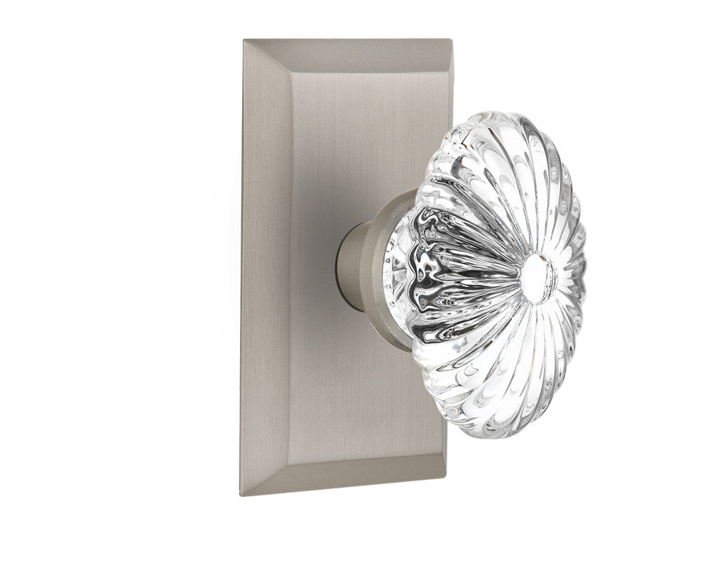Nostalgic 713350: Studio Backplate w/Oval Fluted Clear Glass Crystal Knob Privacy Door Set - Satin Nickel