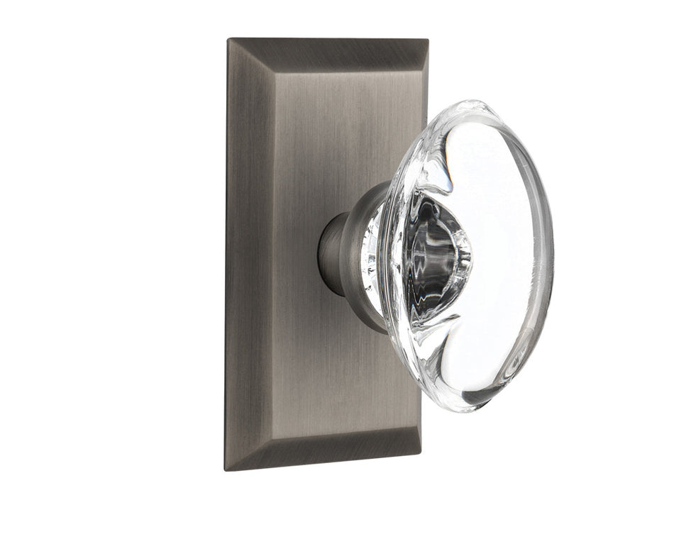 Nostalgic 713435: Studio Backplate w/Oval Clear Glass Crystal Knob Single Dummy Door Set - Antique Pewter