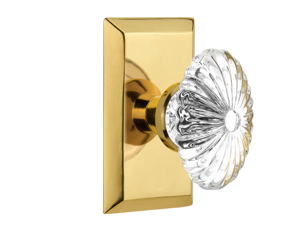 Nostalgic 713445: Studio Backplate w/Oval Fluted Clear Glass Crystal Knob Single Dummy Door Set - Polished Brass