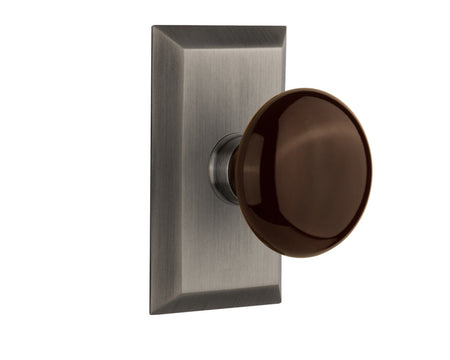 Nostalgic 713483: Studio Backplate w/Brown Porcelain Knob Single Dummy Door Set - Antique Pewter