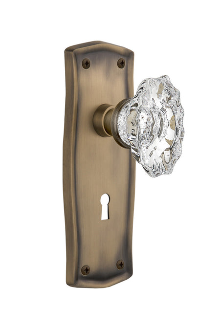 Nostalgic 713695: Prairie Backplate w/Chateau Knob Passage Door Set - Antique Brass