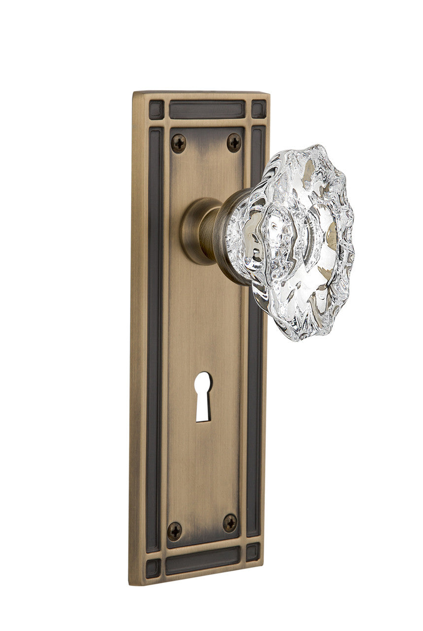 Nostalgic 713706: Mission Backplate w/Chateau Knob Passage Door Set - Antique Brass