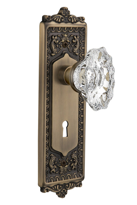 Nostalgic 713973: Egg & Dart Backplate w/Chateau Knob Privacy Door Set - Antique Brass