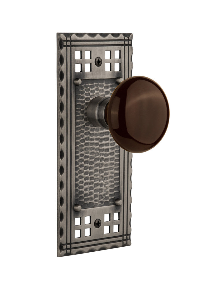 Nostalgic 715267: Craftsman Backplate w/Brown Porcelain Knob Passage Door Set - Antique Pewter