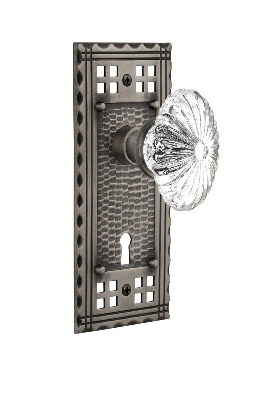Nostalgic 715339: Craftsman Backplate w/Oval Fluted Clear Glass Crystal Knob Passage Door Set - Antique Pewter