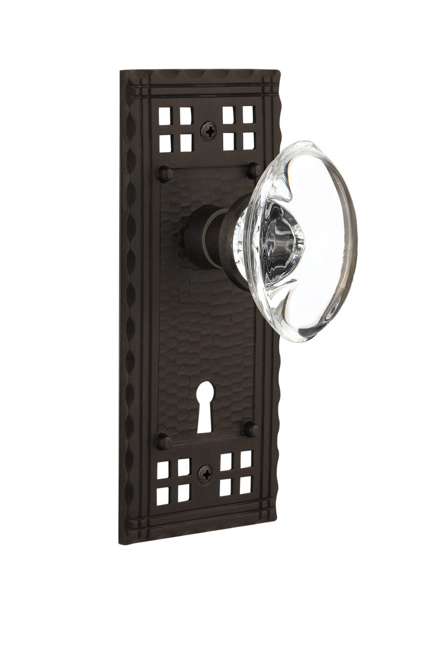Nostalgic 715720: Craftsman Backplate w/Oval Clear Glass Crystal Knob Privacy Door Set - Oil-Rubbed Bronze
