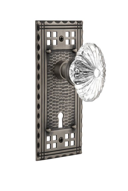 Nostalgic 715723: Craftsman Backplate w/Oval Fluted Clear Glass Crystal Knob Privacy Door Set - Antique Pewter