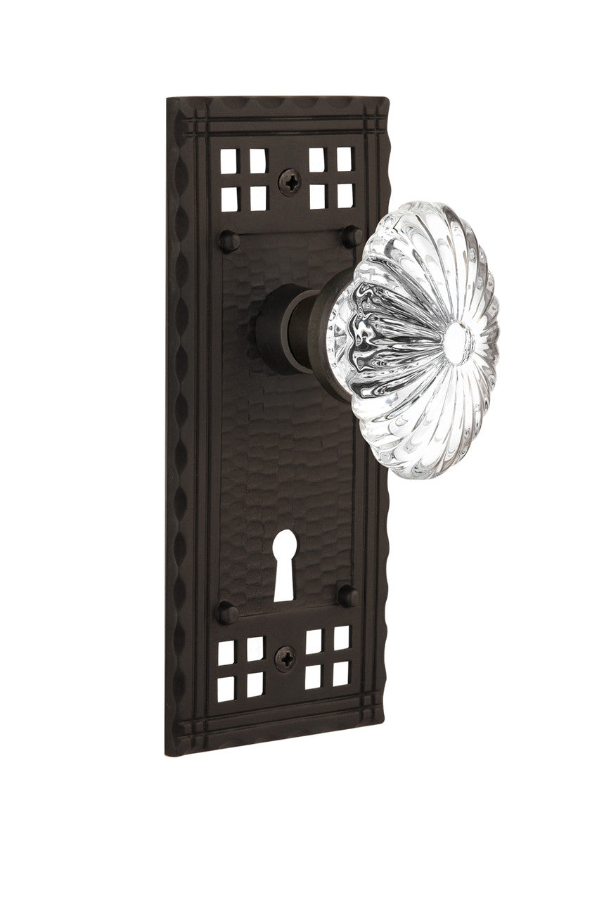 Nostalgic 715724: Craftsman Backplate w/Oval Fluted Clear Glass Crystal Knob Privacy Door Set - Oil-Rubbed Bronze