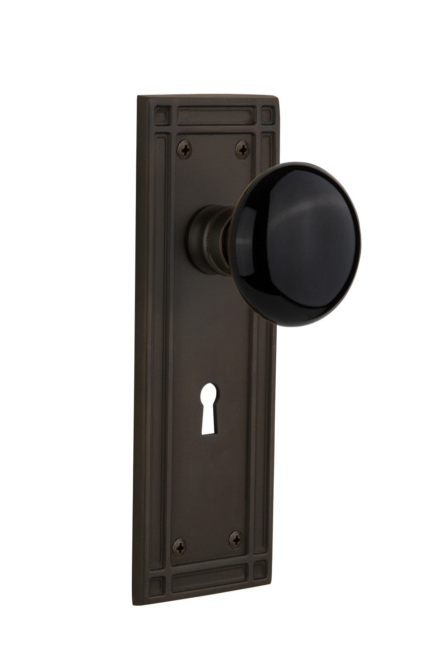 Nostalgic 715904: Mission Backplate w/Black Porcelain Knob Passage Door Set - Oil-Rubbed Bronze