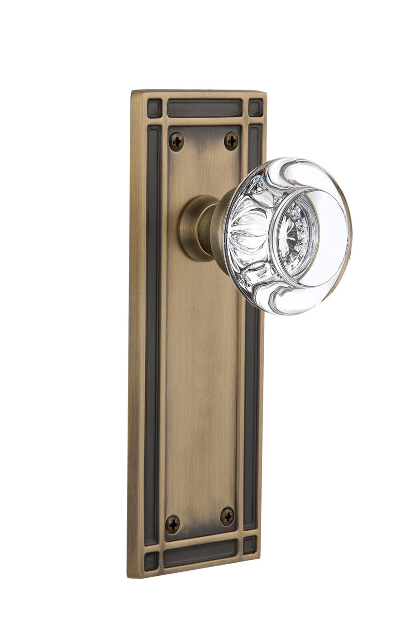 Nostalgic 715986: Mission Backplate w/Round Clear Glass Crystal Knob Single Dummy Door Set - Antique Brass