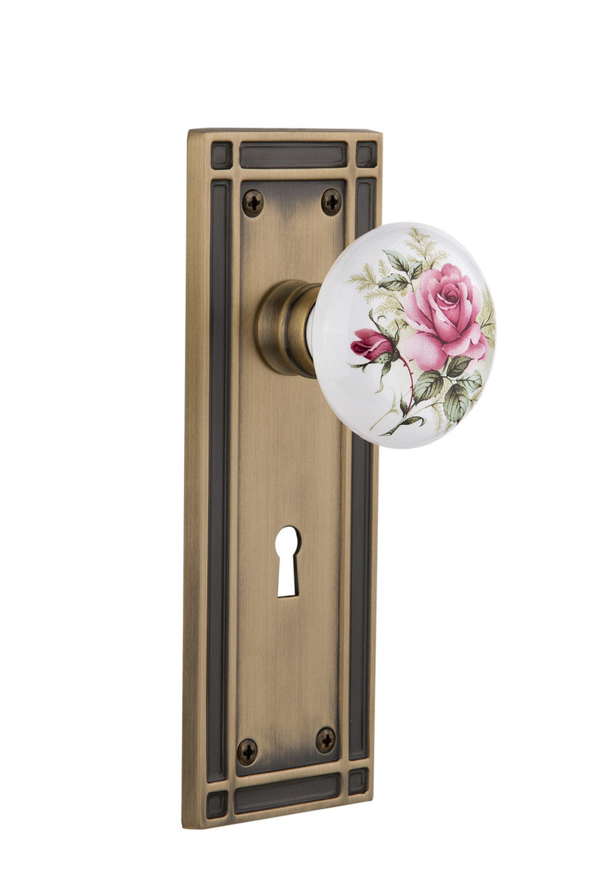 Nostalgic 716046: Mission Backplate w/White Rose Porcelain Knob Single Dummy Door Set - Antique Brass