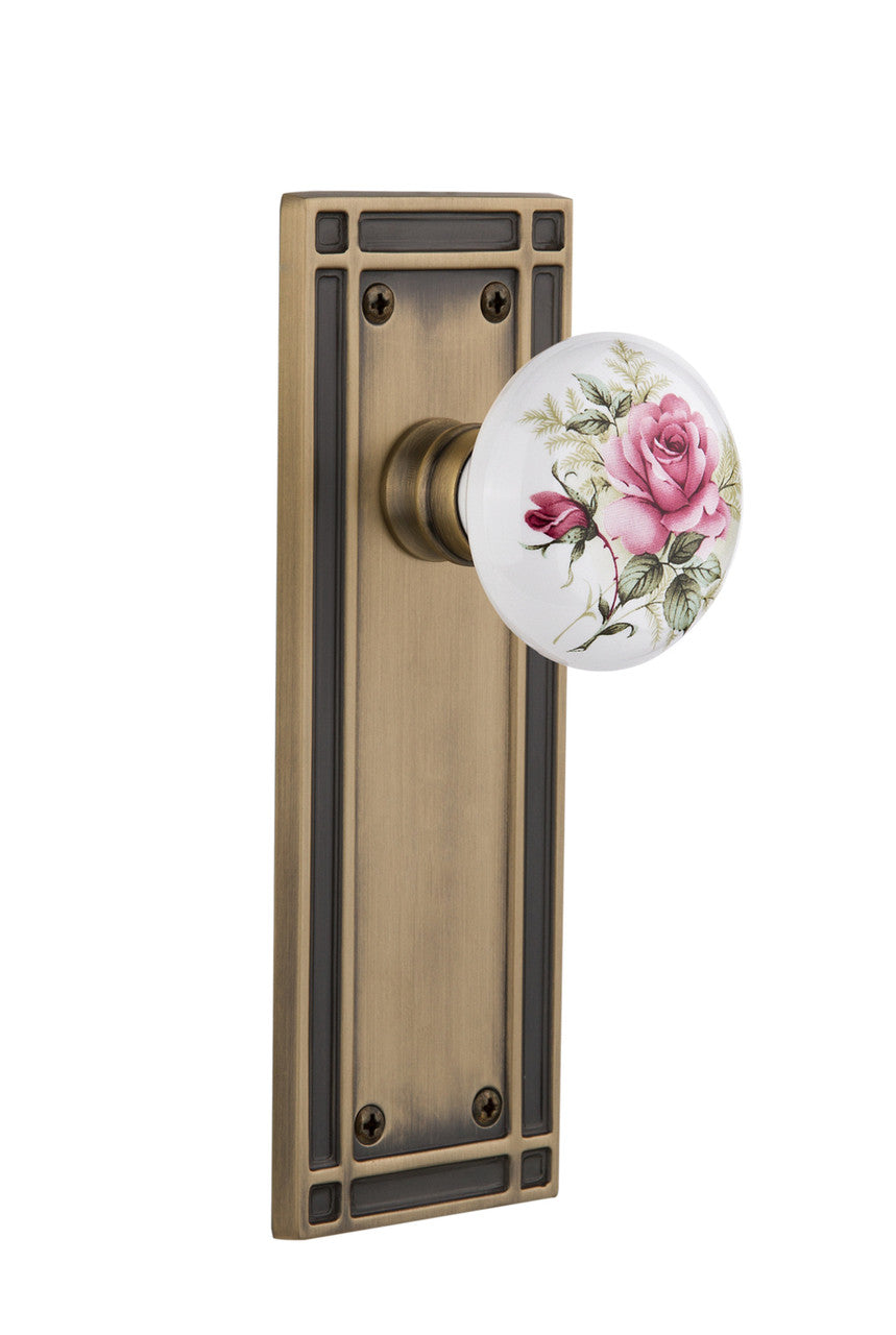 Nostalgic 716238: Mission Backplate w/White Rose Porcelain Knob Privacy Door Set - Antique Brass