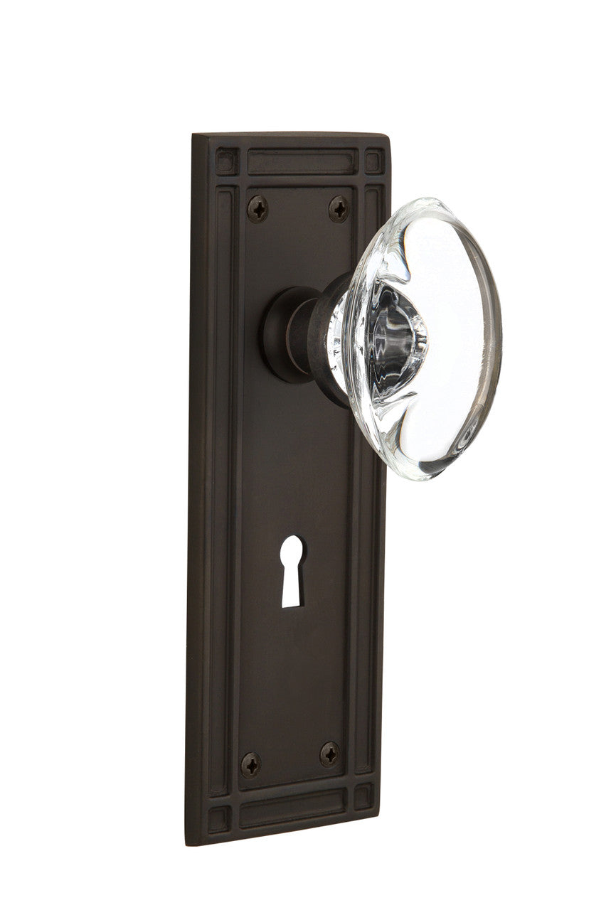 Nostalgic 716296: Mission Backplate w/Oval Clear Glass Crystal Knob Privacy Door Set - Oil-Rubbed Bronze