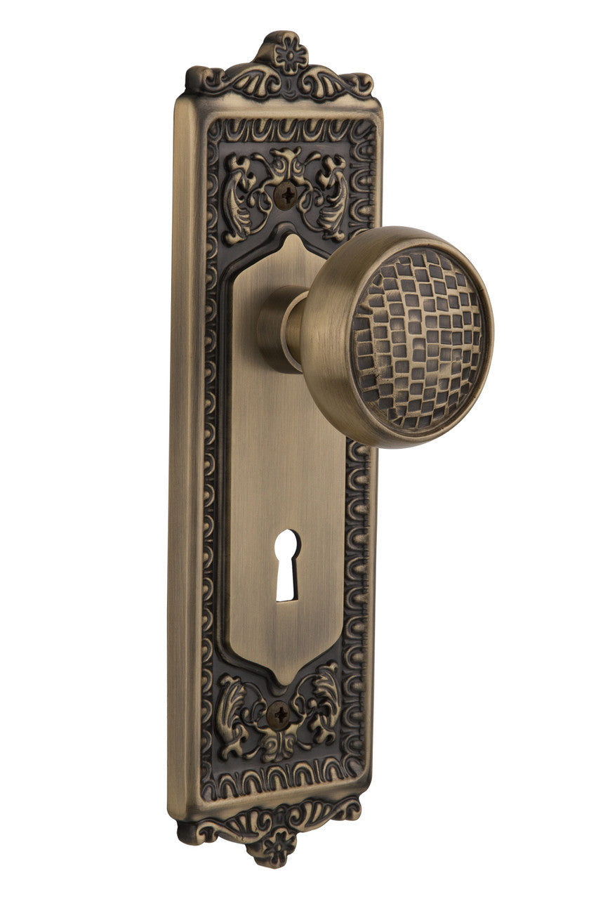 Nostalgic 716410: Egg & Dart Backplate w/Craftsman Knob Passage Door Set - Antique Brass