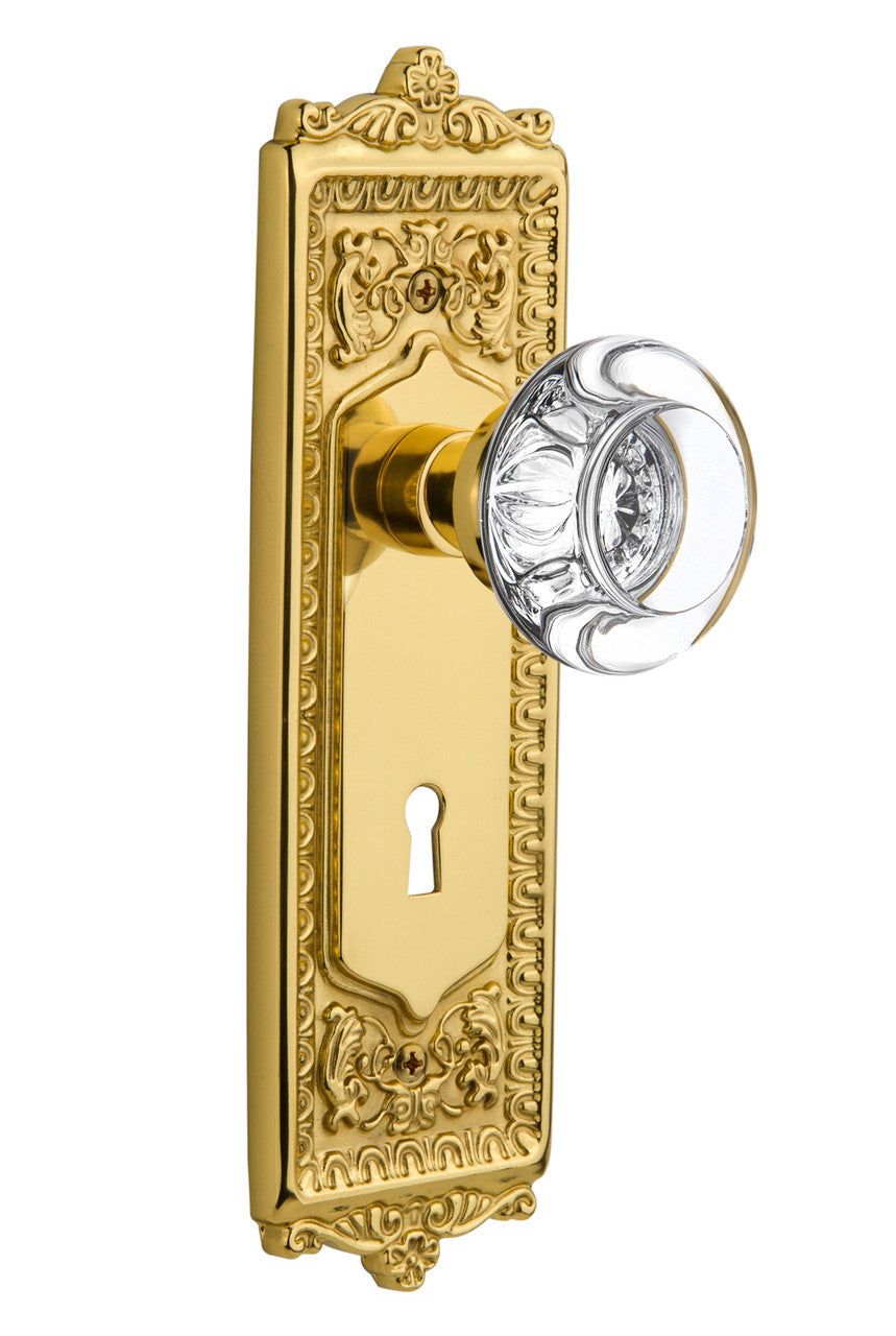 Nostalgic 716951: Egg & Dart Backplate w/Round Clear Glass Crystal Knob Passage Door Set - Unlacquered Brass