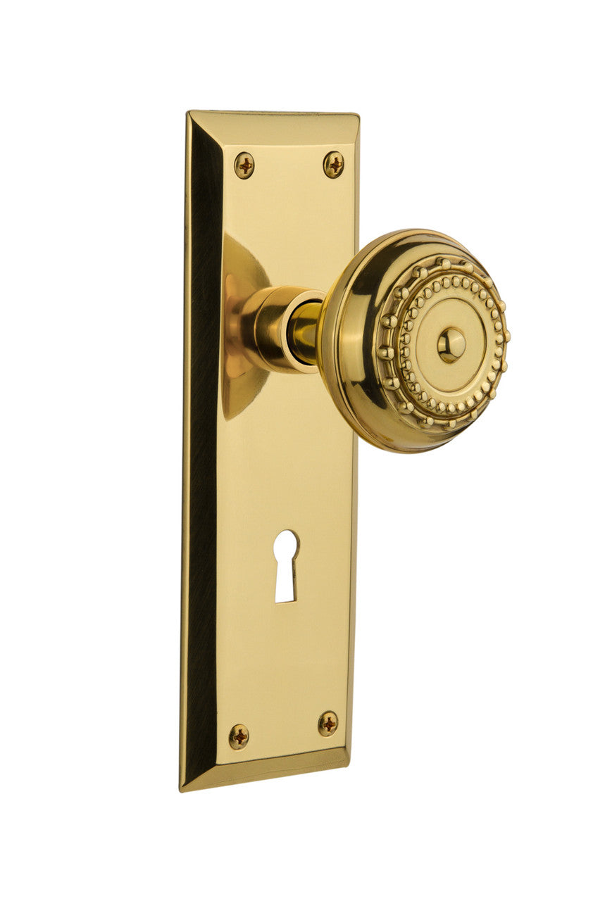 Nostalgic 717072: New York Backplate w/Meadows Knob Privacy Door Set - Unlacquered Brass