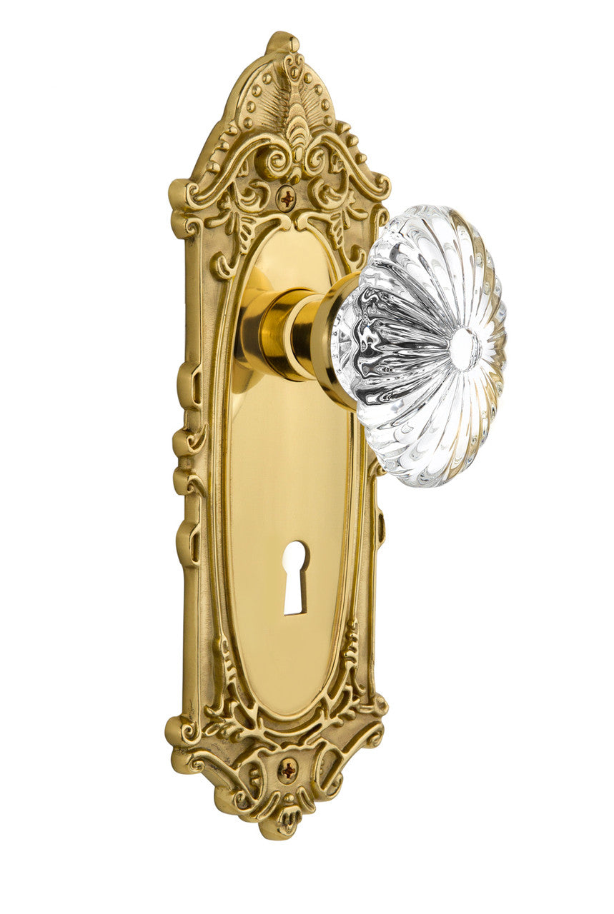 Nostalgic 717132: Victorian Backplate w/Oval Fluted Clear Glass Crystal Knob Privacy Door Set - Unlacquered Brass