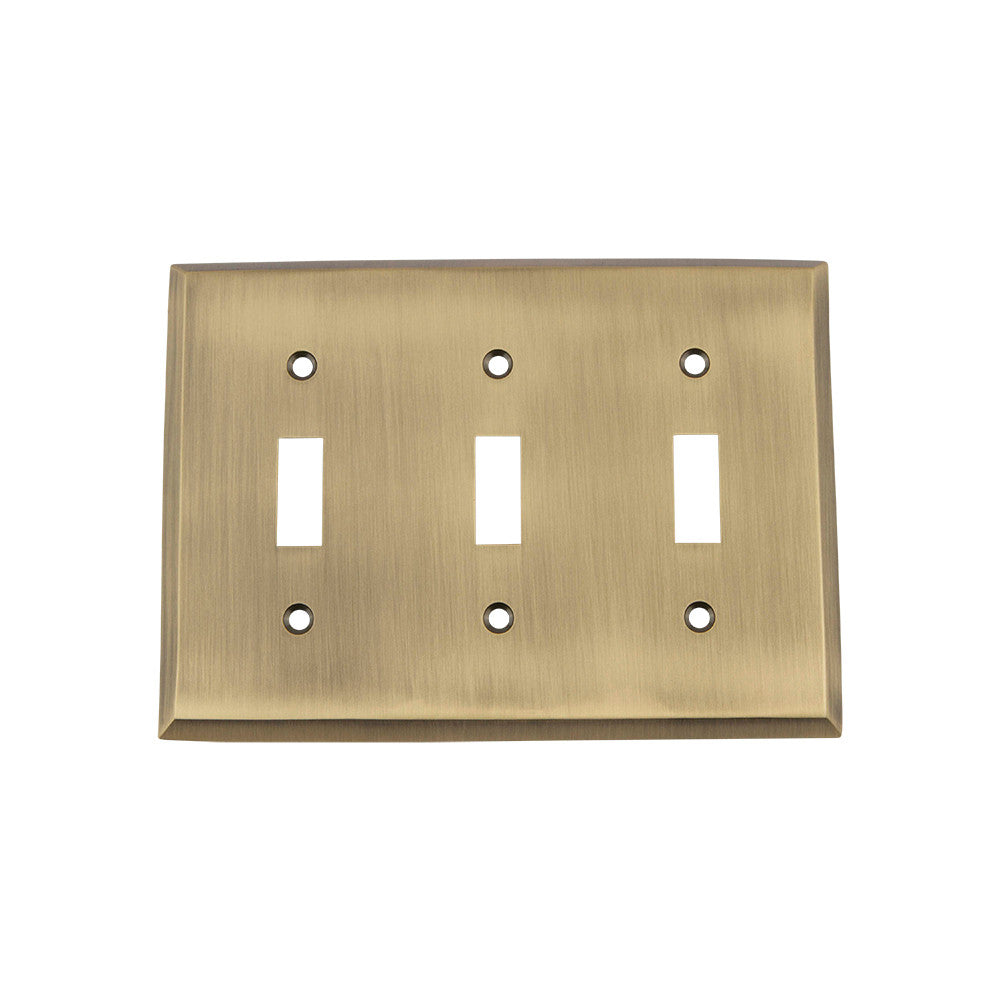 Nostalgic Warehouse 719700: New York Triple Toggle Switchplate - Antique Brass