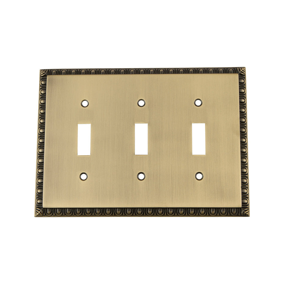 Nostalgic Warehouse 719760: Egg & Dart Triple Toggle Switchplate - Antique Brass