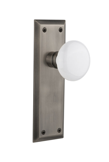 Nostalgic 733101: New York Backplate w/White Porcelain Knob Passage Door Set - Antique Pewter