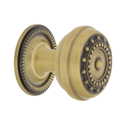 Nostalgic Warehouse 769522: 1-3/8" Meadows Cabinet Knob w/Rope Rose - Antique Brass