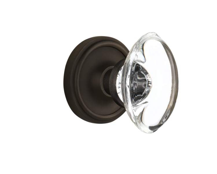 Nostalgic 711611: Classic Rosette w/Oval Clear Glass Crystal Knob Privacy Door Set - Oil-Rubbed Bronze
