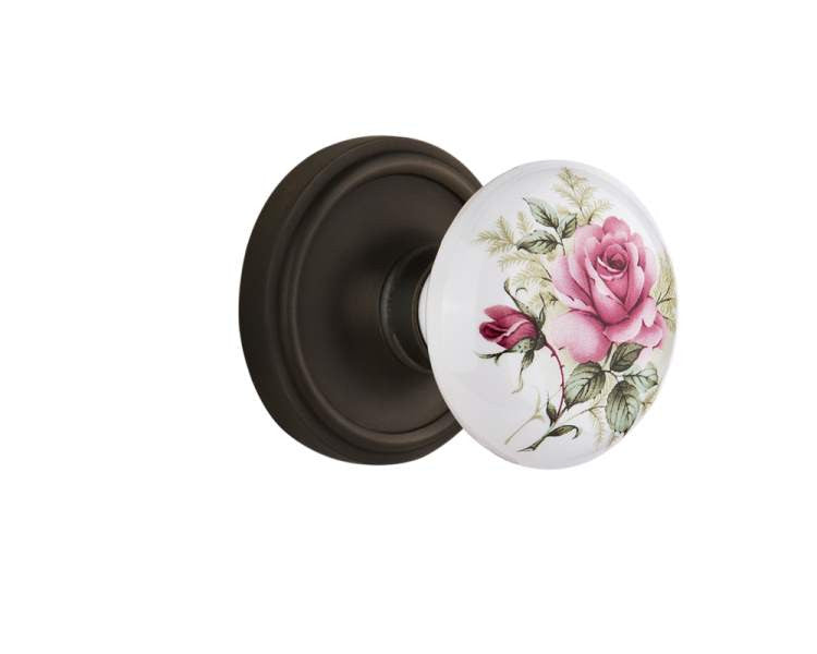 Nostalgic 710883: Classic Rosette w/White Rose Porcelain Knob Passage Door Set - Oil-Rubbed Bronze