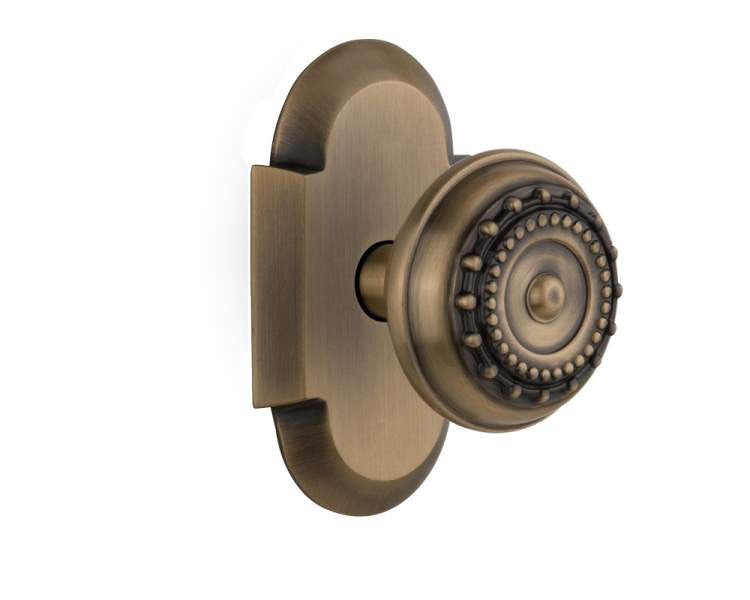 Nostalgic 713013: Cottage Backplate w/Meadows Knob Single Dummy Door Set - Antique Brass
