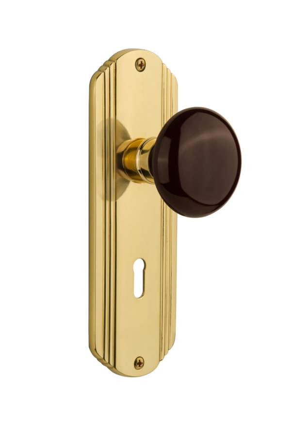 Nostalgic 710498: Deco Backplate w/Brown Porcelain Knob Passage Door Set - Polished Brass