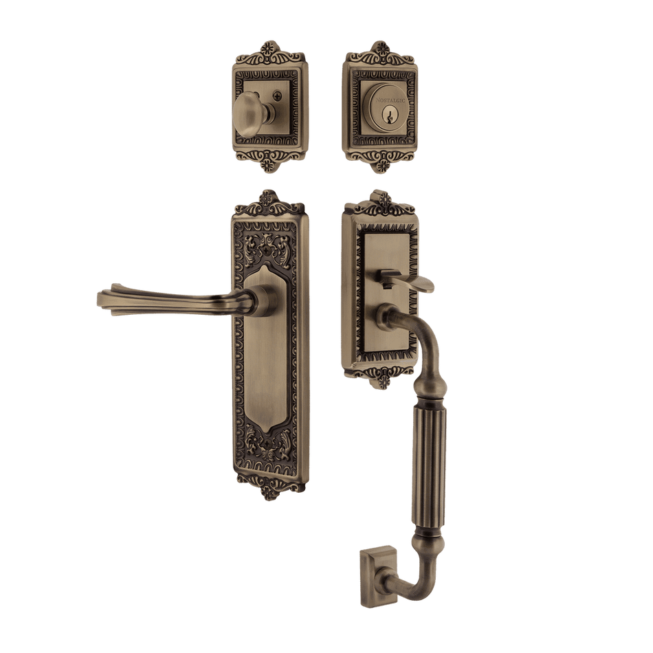 Nostalgic 768833: Entry Lockset w/Egg & Dart Backplate, F-Grip Exterior Handle and Fleur Interior Lever - Antique Brass