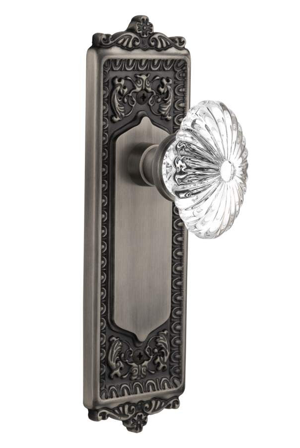 Nostalgic 712056: Egg & Dart Backplate w/Oval Fluted Clear Glass Crystal Knob Privacy Door Set - Antique Pewter