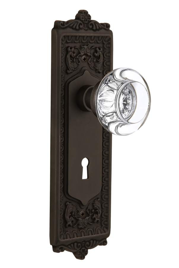 Nostalgic 712360: Egg & Dart Backplate w/Round Clear Glass Crystal Knob Single Dummy Door Set - Oil-Rubbed Bronze
