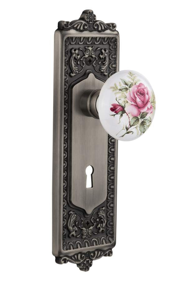 Nostalgic 711038: Egg & Dart Backplate w/White Rose Porcelain Knob Single Dummy Door Set - Antique Pewter