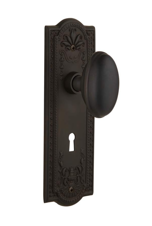 Nostalgic 704353: Meadows Backplate w/Homestead Knob Passage Door Set - Oil-Rubbed Bronze