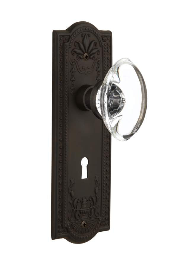 Nostalgic 711679: Meadows Backplate w/Oval Clear Glass Crystal Knob Privacy Door Set - Oil-Rubbed Bronze