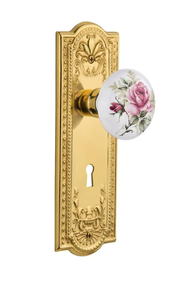 Nostalgic 710952: Meadows Backplate w/White Rose Porcelain Knob Passage Door Set - Polished Brass