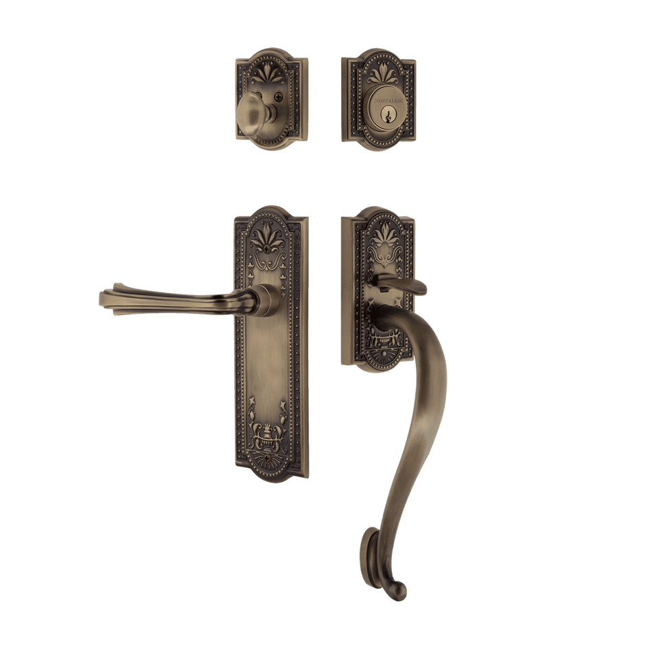 Nostalgic 770411: Entry Lockset w/Meadows Backplate, S-Grip Exterior Handle and Fleur Interior Lever - Antique Brass