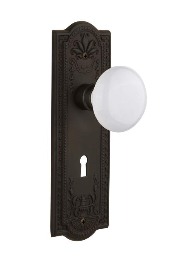 Nostalgic 704425: Meadows Backplate w/White Porcelain Knob Privacy Door Set - Oil-Rubbed Bronze