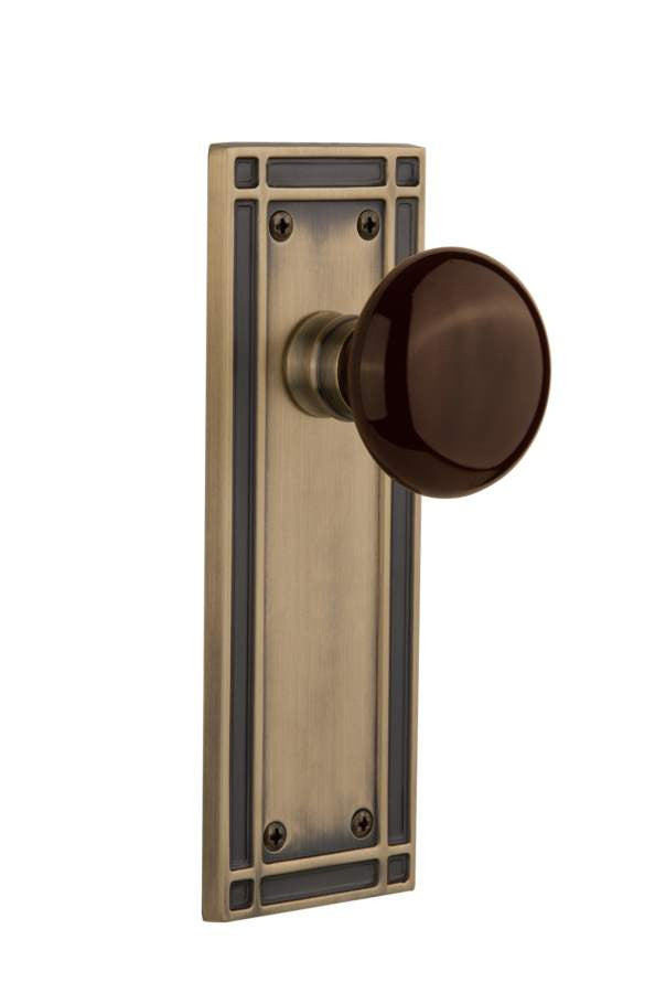 Nostalgic 716226: Mission Backplate w/Brown Porcelain Knob Privacy Door Set - Antique Brass