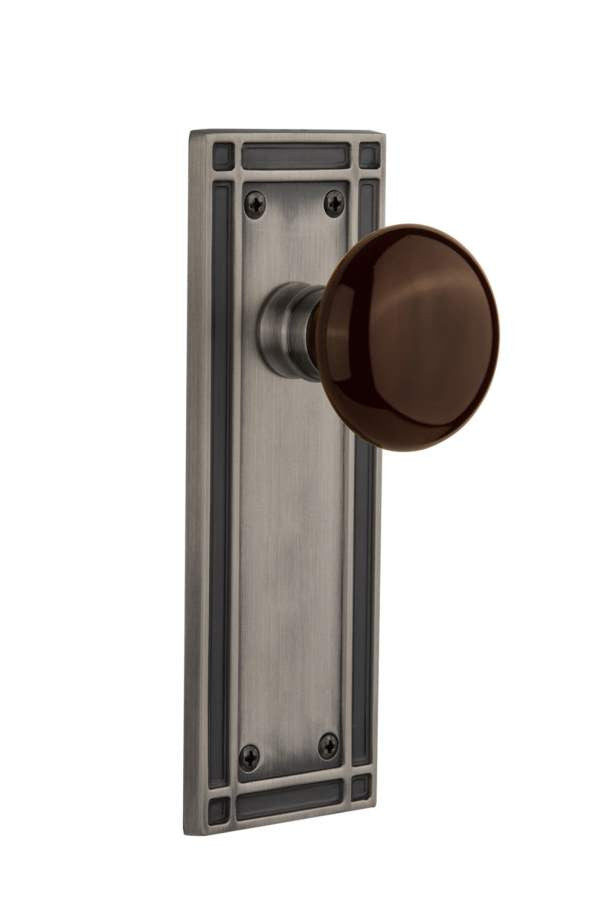 Nostalgic 715843: Mission Backplate w/Brown Porcelain Knob Passage Door Set - Antique Pewter