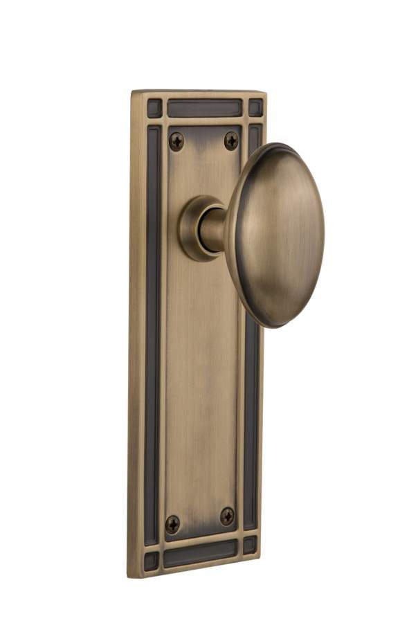 Nostalgic 715942: Mission Backplate w/Homestead Knob Single Dummy Door Set - Antique Brass