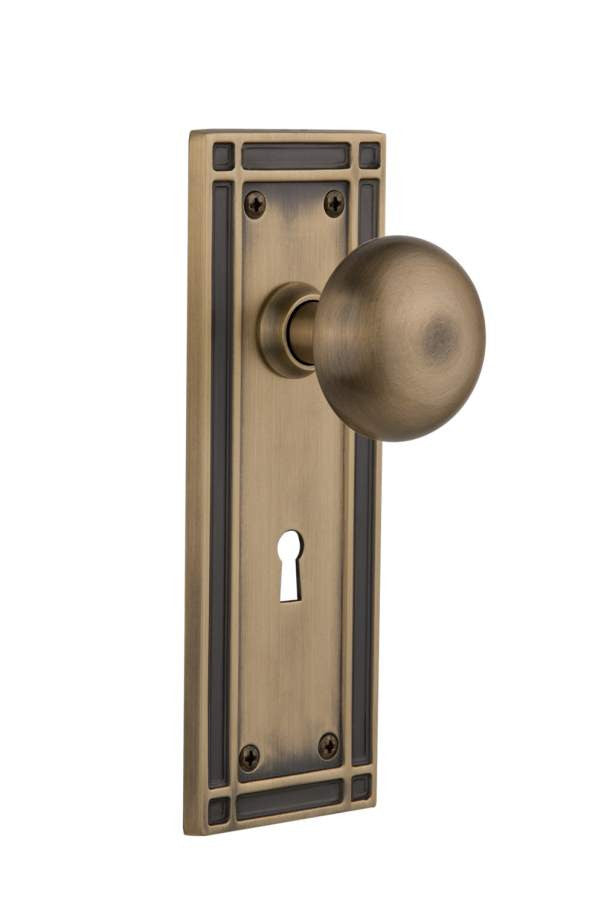 Nostalgic 716270: Mission Backplate w/New York Knob Privacy Door Set - Antique Brass