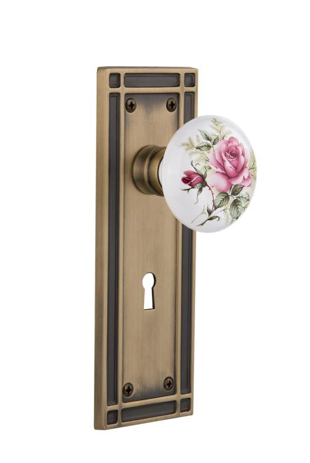 Nostalgic 716046: Mission Backplate w/White Rose Porcelain Knob Single Dummy Door Set - Antique Brass