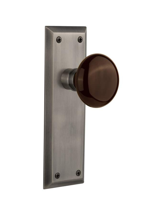 Nostalgic 710558: New York Backplate w/Brown Porcelain Knob Single Dummy Door Set - Antique Pewter