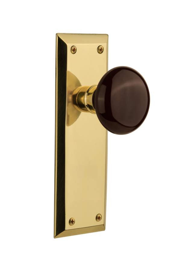 Nostalgic 702912: New York Backplate w/Brown Porcelain Knob Single Dummy Door Set - Unlacquered Brass