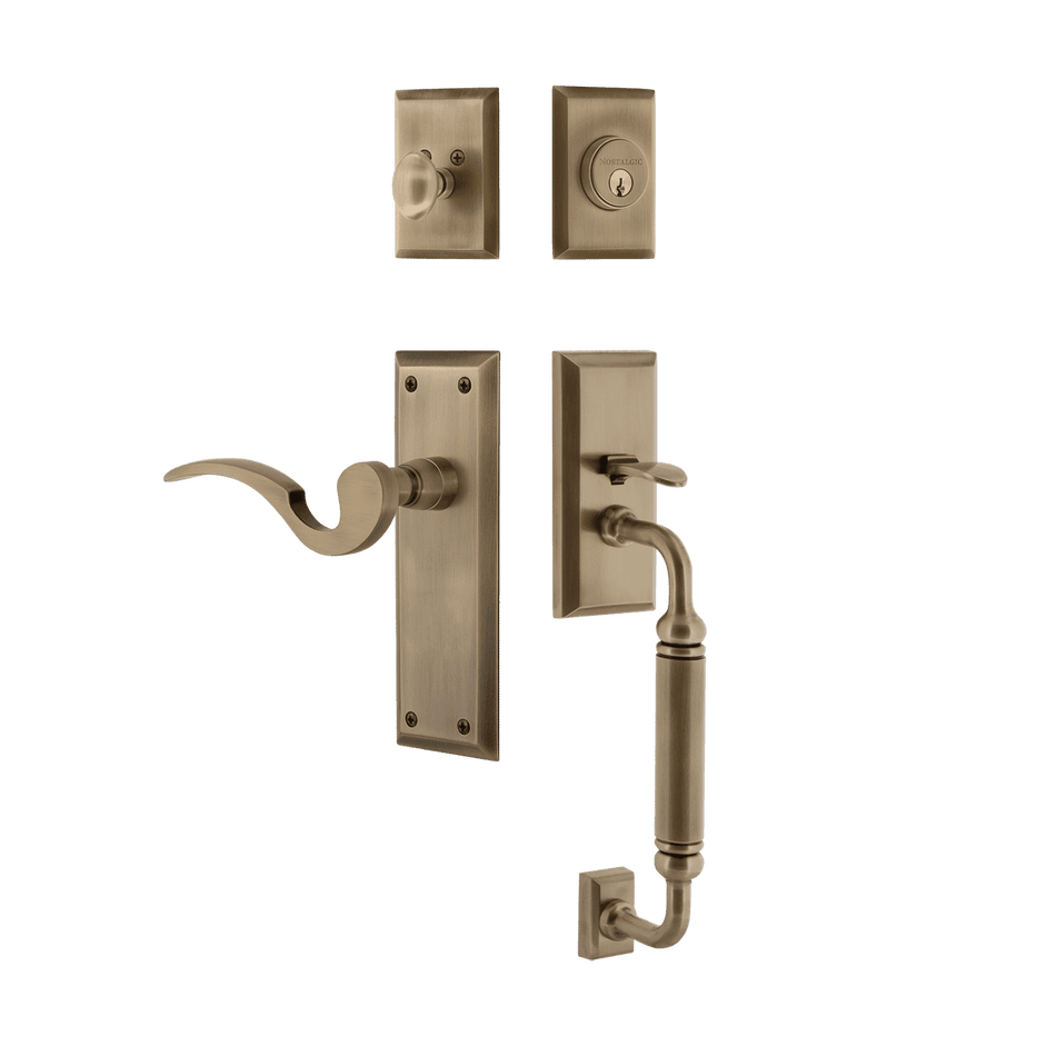 Nostalgic 767553: Entry Lockset w/New York Backplate, C-Grip Exterior Handle and Manor Interior Lever - Antique Brass
