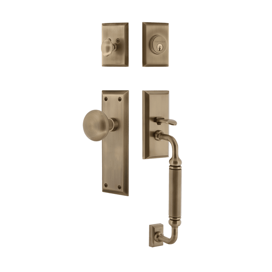Nostalgic 727663: Entry Lockset w/New York Backplate, C-Grip Exterior Handle and New York Knob - Antique Brass