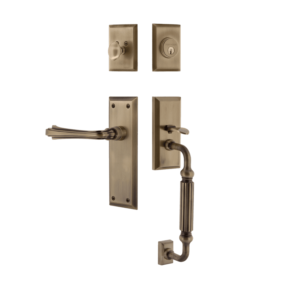 Nostalgic 768986: Entry Lockset w/New York Backplate, F-Grip Exterior Handle and Fleur Interior Lever - Antique Brass